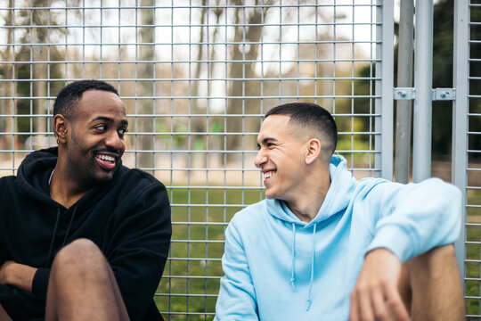 Young smiling men resting