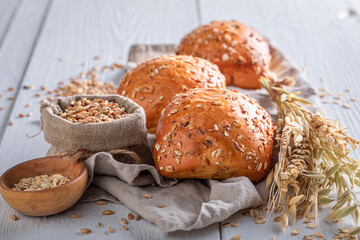 Homemade and hot oat buns for tasty breakfast.