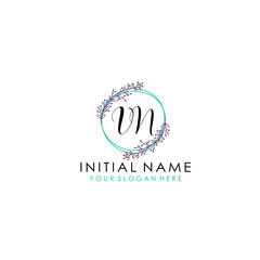 Obraz premium Initial letter VN handwriting with floral frame template