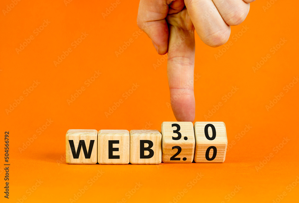 Wall mural web 2.0 or 3.0 symbol. businessman turns wooden cubes and changes concept words web 2.0 to web 3.0. 