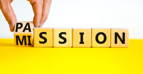 Do your mission with passion. Businessman turns wooden cubes, changes the concept word Mission to Passion. Beautiful white background. Business motivational passion and mission concept. Copy space.