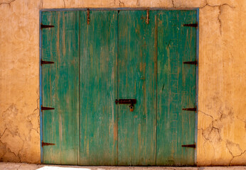 UAE March 2022. Old wooden door in a building in the old town area.