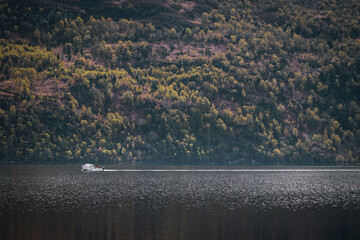 Boat Sailing Through The Loch