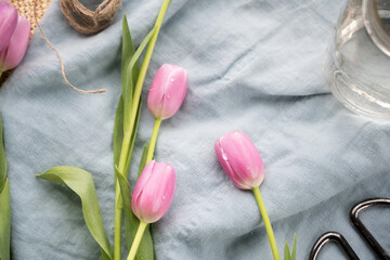 Fresh tulips on table