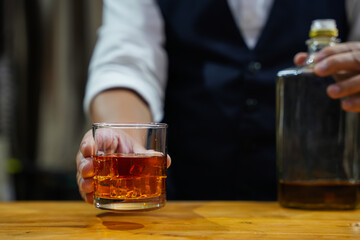 Bartender Serve Whiskey, on wood bar, 