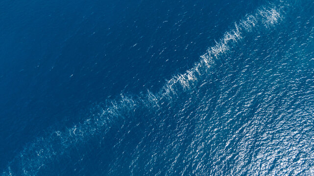 aerial overhead view of a sea wave