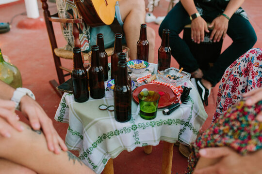 Table with beers and empty dishes