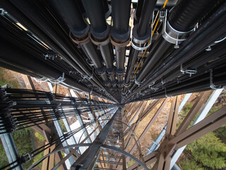Overhead view of the telecommunication tower full of high-speed cables