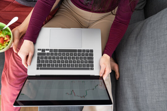 Anonymous Couple Analysing Stock Market Graph