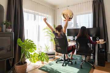 Couple Working Remotely At Stylish Home 