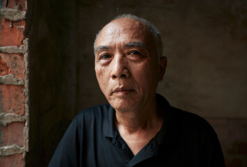 Asian middle aged man at home

