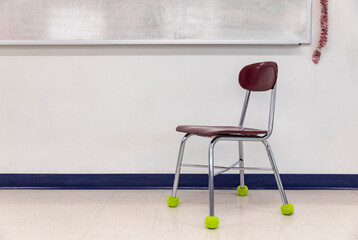 School Classroom Interior with Desk and Chairs with Tennis balls 