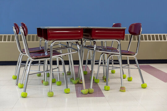 School Classroom Interior with Desk and Chairs with Tennis balls 
