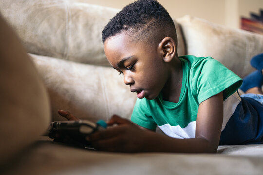 Kid playing with a game console