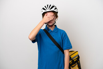 Young English woman with thermal backpack isolated on white background covering eyes by hands. Do not want to see something