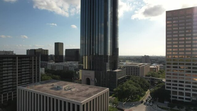 Unique Perspective Of A Interesting Tall Building By The Known Galleria Are In Houston, TX With Glares Of The City And Also Traffic