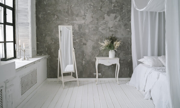 Mirror and boudoir retro table in the interior
