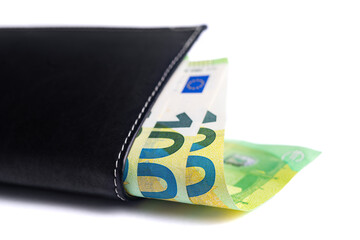 Black leather wallet with several one hundred euro banknotes, isolated on the white background