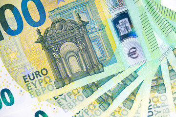 Detail of the Baroque and Rococo style arch on the one hundred euro banknote. European currency close-up.
