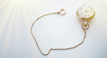 Fototapeta premium Vintage pocket watch on white isolate.A clean place for text.The passing time.Buying and selling antiques.Buying things from the population.