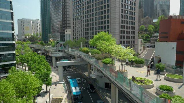 Aerial view of Seoullo 7017 skygarden park and city traffic