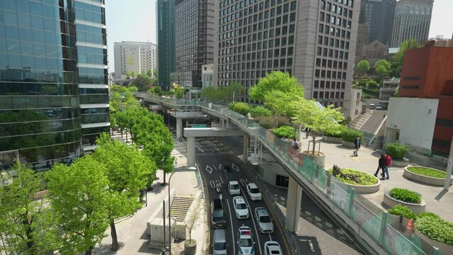 People strolling along Seoullo 7017 skygarden park in South Korea - elevated view