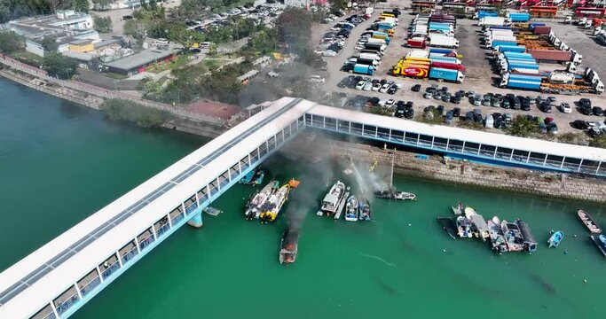 Tuen Mun, Hong Kong Top view of Hong Kong residential area with fire accident occur on boat