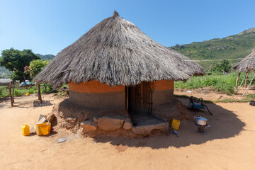 Traditional Zimbabwean hut made from clay and hay - obrazy, fototapety, plakaty