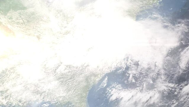 Earth zoom in from outer space to city. Zooming on Winston Salem, North Carolina, USA. The animation continues by zoom out through clouds and atmosphere into space. Images from NASA