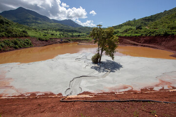A tailings dam built to contain permanently byproducts of gold mining