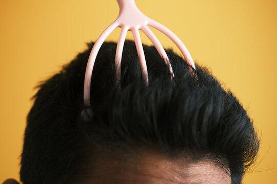  Men Having A Scalp Massage With A Brush ,