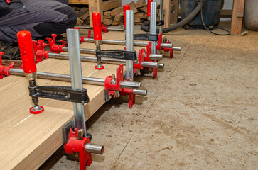 Preparing to cut a wooden board. Markings on the board. Joinery work.