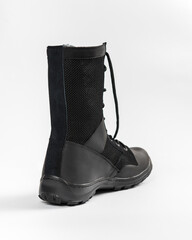 Leather military tactical boots isolated on white background