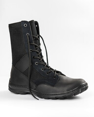 Leather military tactical boots isolated on white background