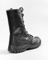 Leather military tactical boots isolated on white background