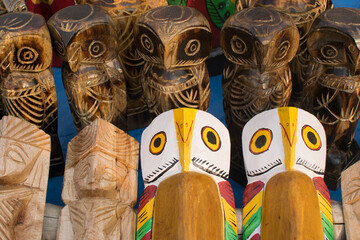 KOLKATA, WEST BENGAL , INDIA - NOVEMBER 23RD 2014 : Wooden owls, artworks of handicraft, on display during Handicraft Fair in Kolkata - the biggest handicrafts fair in Asia.