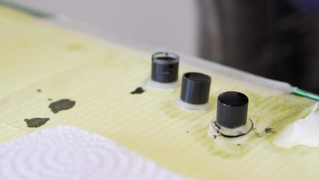Ink cups used for diferent grey tones in tattoo