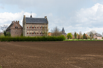 Fototapeta na wymiar Ohe en Laak, Limburg, The Netherlands, Rural fields and historical buildings of the village