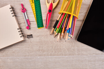 Obraz premium Top view office stationery accessories and copy space. Scissors with pencils and rulers.