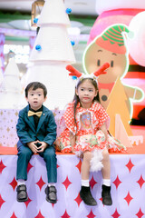 Merry Christmas boy and Girls dress up for Christmas celebrations.