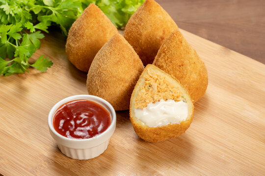 Coxinha of chicken with catupiry cheese, a traditional Brazilian snack.