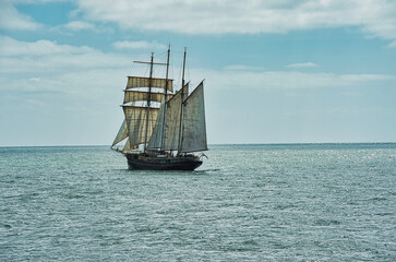 Old sailing ship under sail on the sea