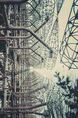 Rusty old children's machine in an abandoned amusement park in carting, the ghost town of Pripyat, Chernobyl, the consequences of reactor explosions