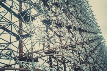 Rusty old children's machine in an abandoned amusement park in carting, the ghost town of Pripyat, Chernobyl, the consequences of reactor explosions