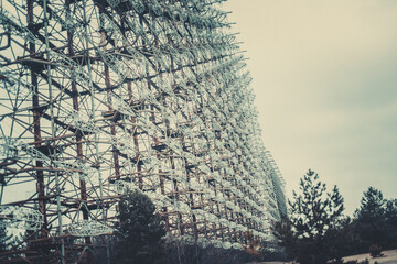 Rusty old children's machine in an abandoned amusement park in carting, the ghost town of Pripyat,...