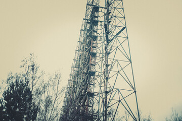 Rusty old children's machine in an abandoned amusement park in carting, the ghost town of Pripyat,...