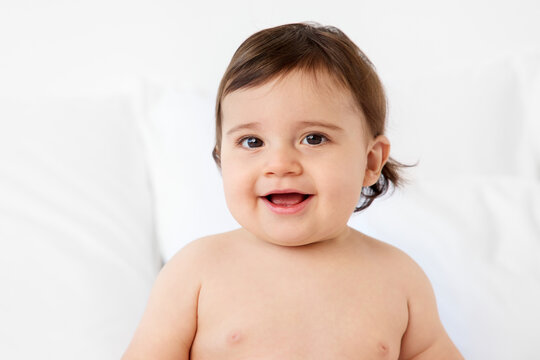Smiling portrait of chubby baby boy