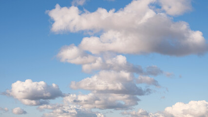 blue sky background with tiny clouds