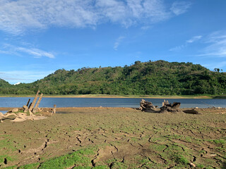 Landscape of reservoir with cracked mud in summer season  in Nakornnayok province, Thailand