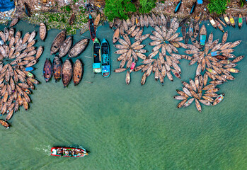 Fishing boats are arranged in river shore